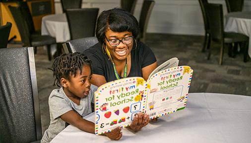 SASP student reading to child